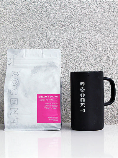 A white bag of coffee beans from Rosso Coffee Roasters